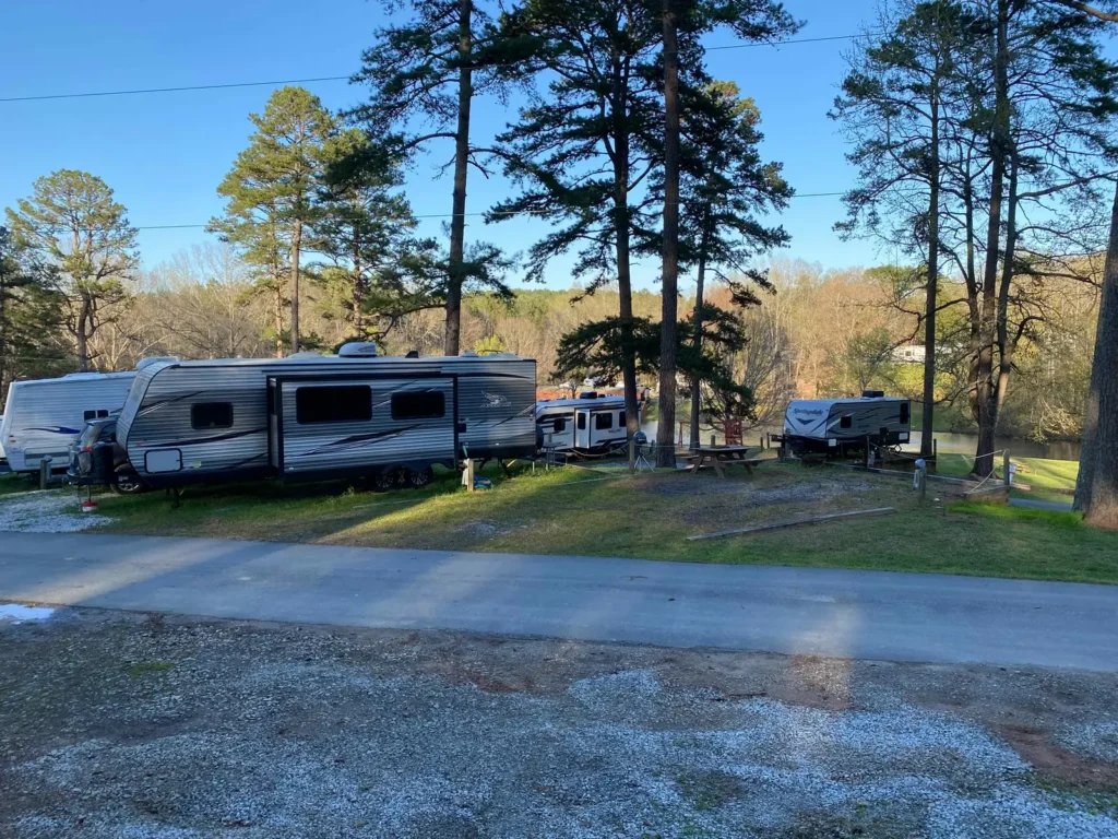 Wooded RV sites with full hookups at Cobble Hill
