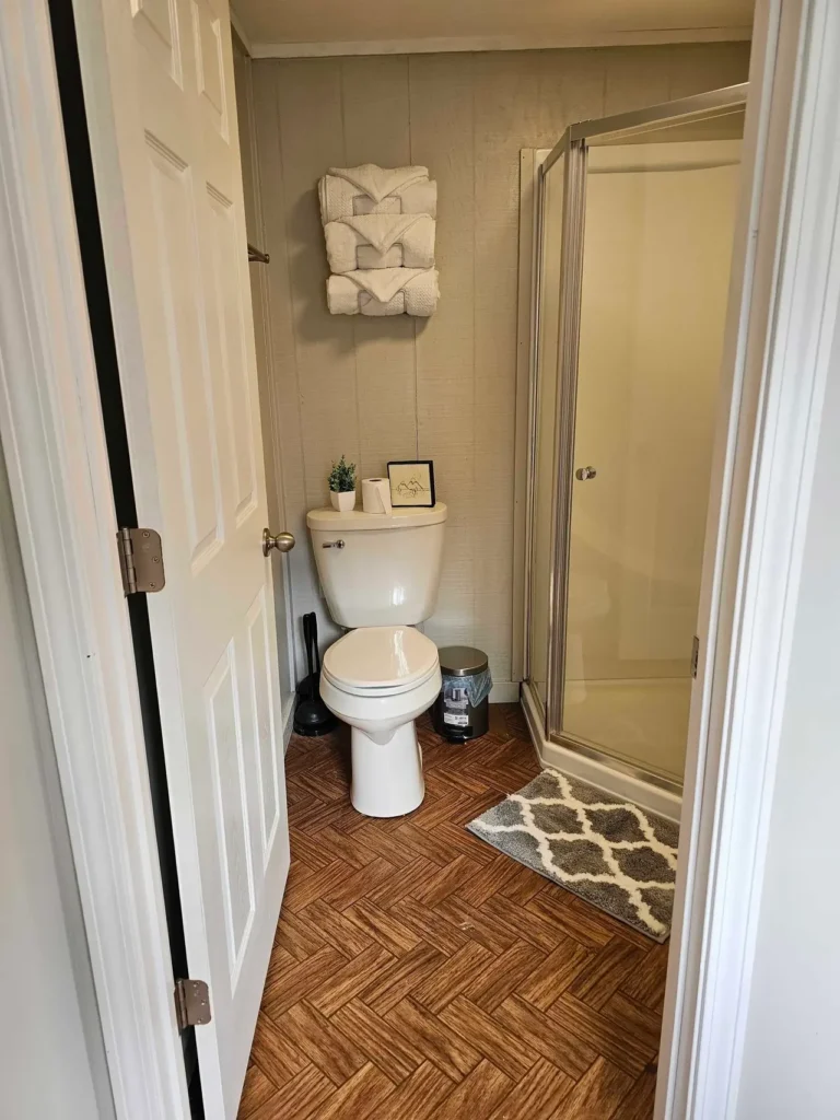 Bathroom with shower in the Modern Woodland Cabin
